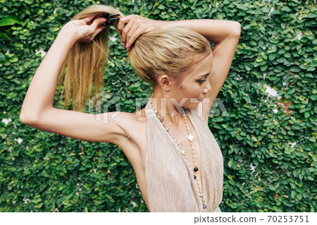 Woman with long blond hair 70253751