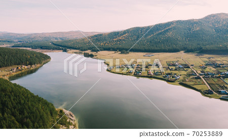 Beautiful large lake in the forest Beautiful large lake in the forest 70253889