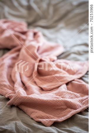 Pink blanket on the bed close up Pink blanket on the bed close up 70253966