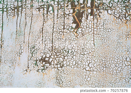 Painted metal with cracks in the paint, roughness, rust. Background, texture. 70257876