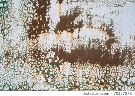 Painted metal with cracks in the paint, roughness, rust. Background, texture. 70257878