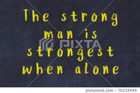 Black chalkboard with wise inscription on it 70258449