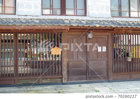 A view of a retro building with a lattice door in Joge 70260227