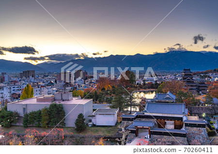 Matsumoto City's dusk and Matsumoto Castle seen from the city hall observatory [Nagano Prefecture] 70260411