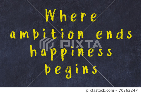 Chalk wise inscription on black chalkboard 70262247