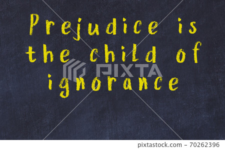 Black chalkboard with wise inscription on it Black chalkboard with wise inscription on it 70262396