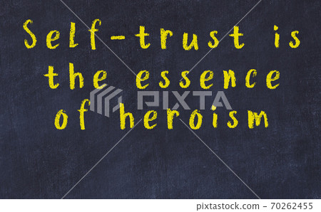 Chalk inscription of smart quote on black desk Chalk inscription of smart quote on black desk 70262455