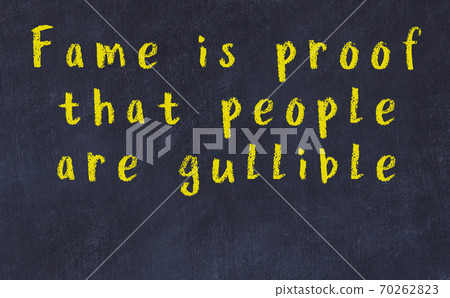 Chalk wise inscription on black chalkboard Chalk wise inscription on black chalkboard 70262823