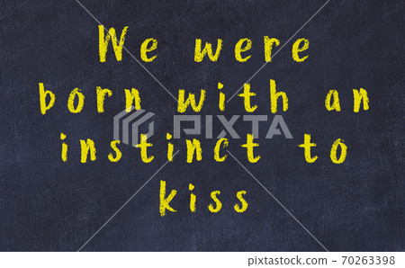Chalk wise inscription on black chalkboard Chalk wise inscription on black chalkboard 70263398
