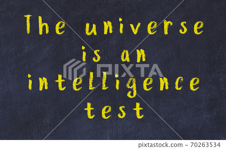 Chalk inscription of smart quote on black desk 70263534