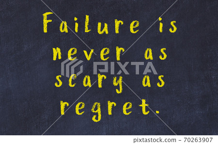 Chalk wise inscription on black chalkboard Chalk wise inscription on black chalkboard 70263907