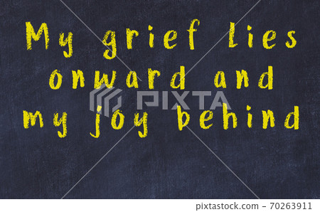 Chalk inscription of smart quote on black desk Chalk inscription of smart quote on black desk 70263911