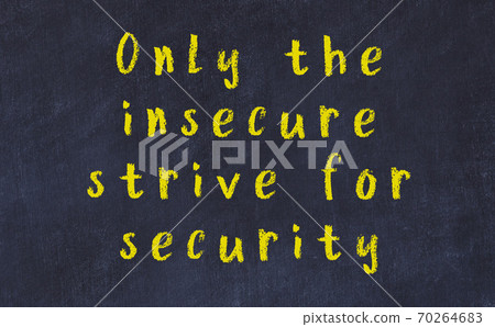 Black chalkboard with wise inscription on it 70264683