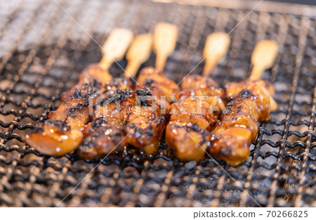 Yakitori peach grilled over charcoal 70266825