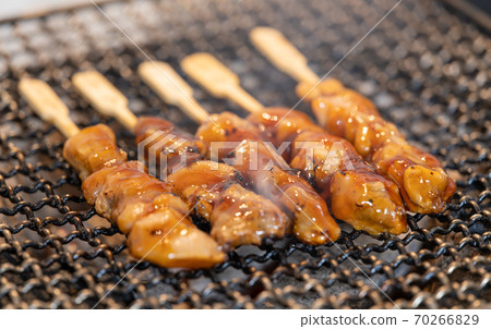 Yakitori peach grilled over charcoal 70266829