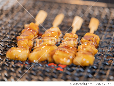 Yakitori (chicken kawa) grilled over charcoal Yakitori (chicken kawa) grilled over charcoal 70267232