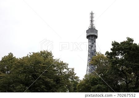 Petrin tower in Prague with view from the pedestal towards the sky Petrin tower in Prague with view from the pedestal towards the sky 70267552