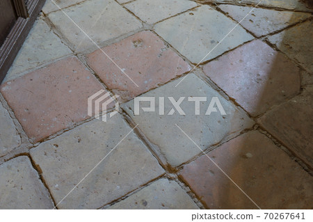 Timeworn Clay floor tiles, very old probably from the 18th century 70267641