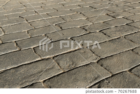 Stamped concrete pavement outdoor, mimics cobblestones pattern, decorative appearance colors and textures of paving cobble stone 70267688