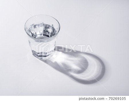 Water poured into a glass Water poured into a glass 70269105