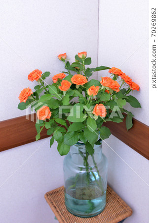 Orange and yellow mini rose vase Orange and yellow mini rose vase 70269862
