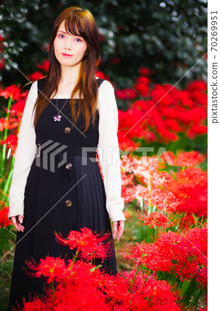 Female portrait in cluster amaryllis 70269951