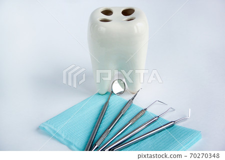 Group of tools and accessories for the dentist. 70270348