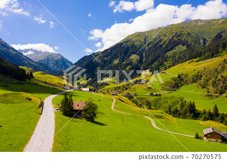 Summer mountain landscape of Swiss Alps in canton of Grisons Summer mountain landscape of Swiss Alps in canton of Grisons 70270575