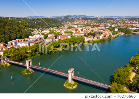 View from drone of Givors summer cityscape on Rhone river, France 70270666