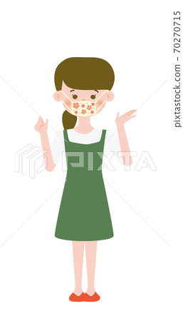 Green dress sister wearing a handmade mask Green dress sister wearing a handmade mask 70270715