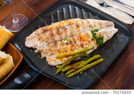 Slices of roasted sea bass Slices of roasted sea bass 70270839