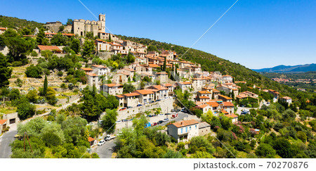 Summer view of French village of Eus with medieval church Summer view of French village of Eus with medieval church 70270876
