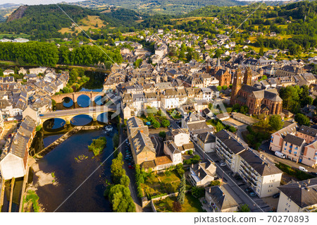 Aerial view of French commune of Espalion on Lot river in summer Aerial view of French commune of Espalion on Lot river in summer 70270893