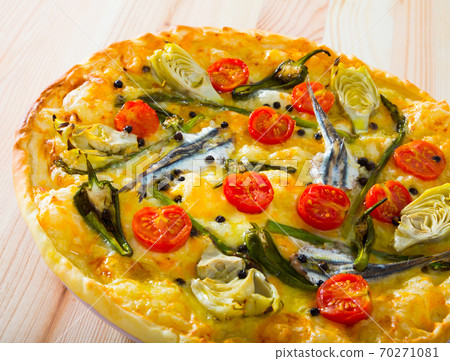 Mediterranean pizza with anchovies 70271081