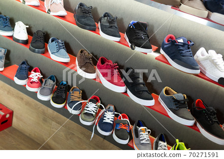 Style male sneakers on shelves Style male sneakers on shelves 70271591