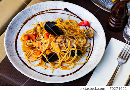 Mediterranean pasta with seafood Mediterranean pasta with seafood 70271621