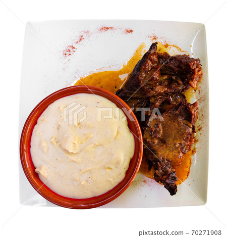 Beef stew served with mashed potatoes at plate Beef stew served with mashed potatoes at plate 70271908
