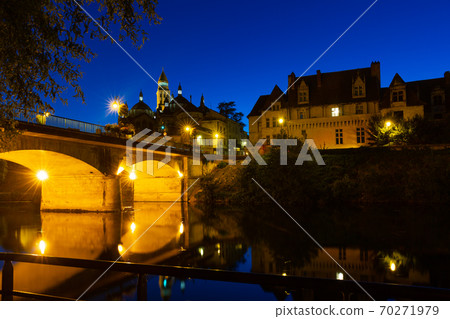 View across river of illuminated Perigueux Cathedral at twilight, France View across river of illuminated Perigueux Cathedral at twilight, France 70271979