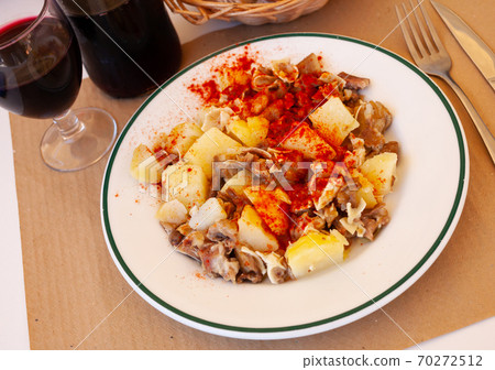 Orejas de cerdo - spanish dish. Roast pigs ears Orejas de cerdo - spanish dish. Roast pigs ears 70272512