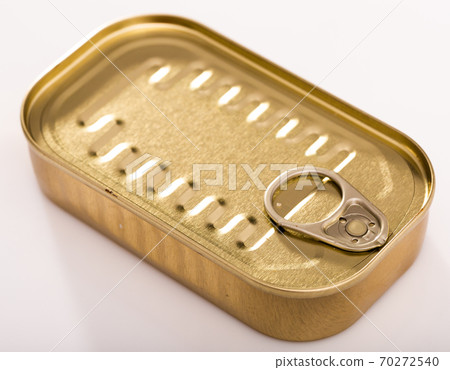Close-up of metal bronze tin can with ring pull on white background Close-up of metal bronze tin can with ring pull on white background 70272540