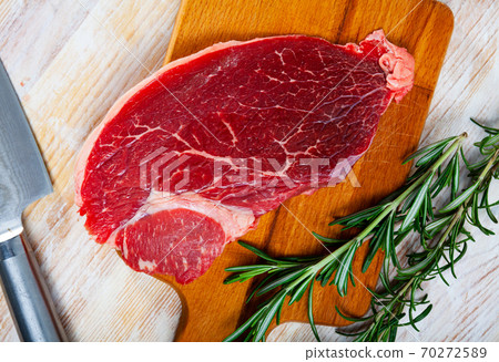 Raw beef entrecote with rosemary 70272589
