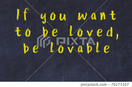 Chalk inscription of smart quote on black desk Chalk inscription of smart quote on black desk 70273307