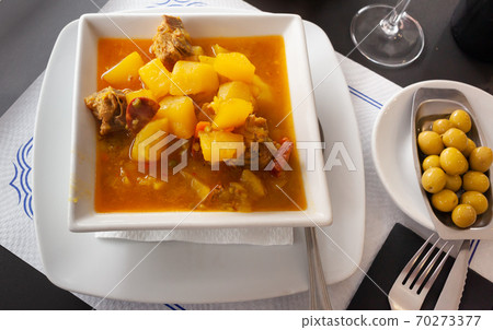 Potatoes with ribs and chorizo. Spanish cuisine 70273377