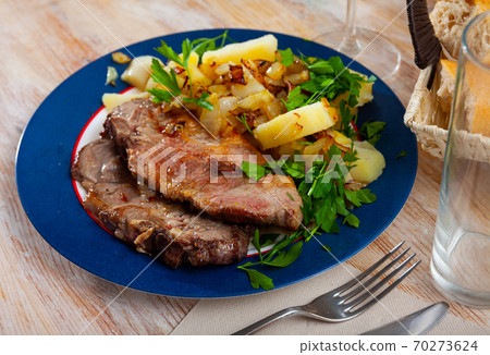 Grilled pork loin chops with boiled potato 70273624
