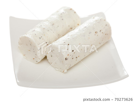 Soft goat cheese with herbs and garlic 70273626