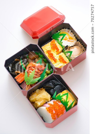 New Year dishes for one person packed in a small heavy box 70274757