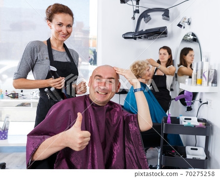 Happy man after haircut Happy man after haircut 70275258