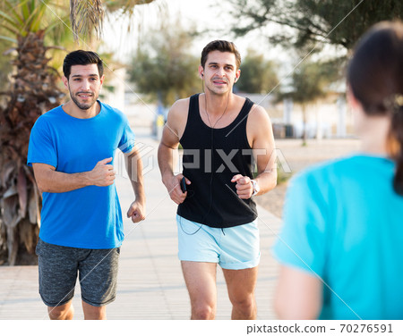 Two friends are jogging in time training Two friends are jogging in time training 70276591