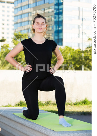 Girl doing workout outdoors Girl doing workout outdoors 70276700
