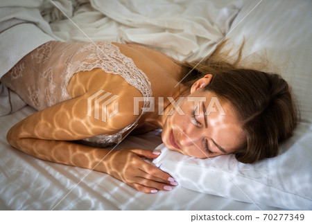 Portrait of sleeping woman 70277349